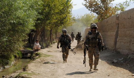 Soldiers patrolling in a common crisis management situation