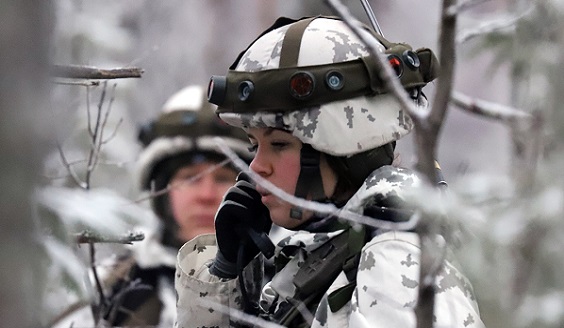 Woman soldier in forest