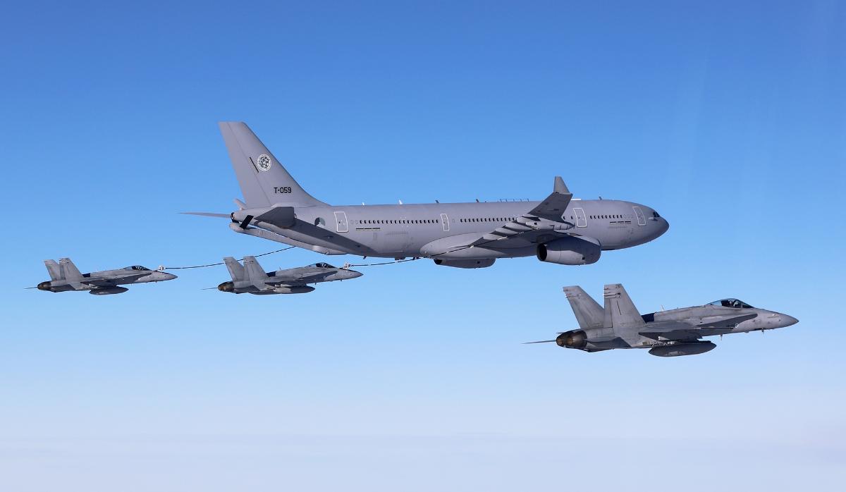 A330 MRTT tanker aircraft and three Finnish F/A-18 Hornet fighter jets