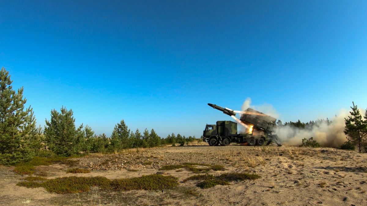 Anti-ship missile is being fired from the coastal area.