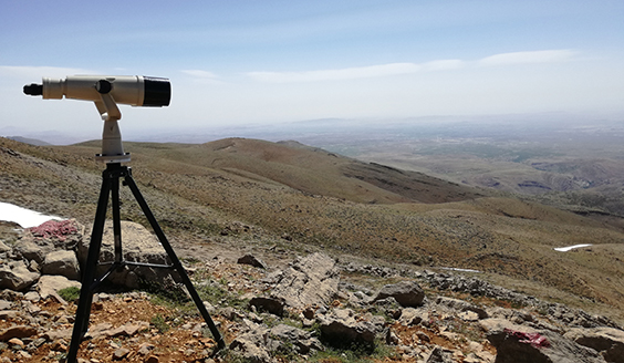 Binoculars on top of a mountain