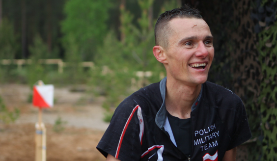 Laughing man in sports suit